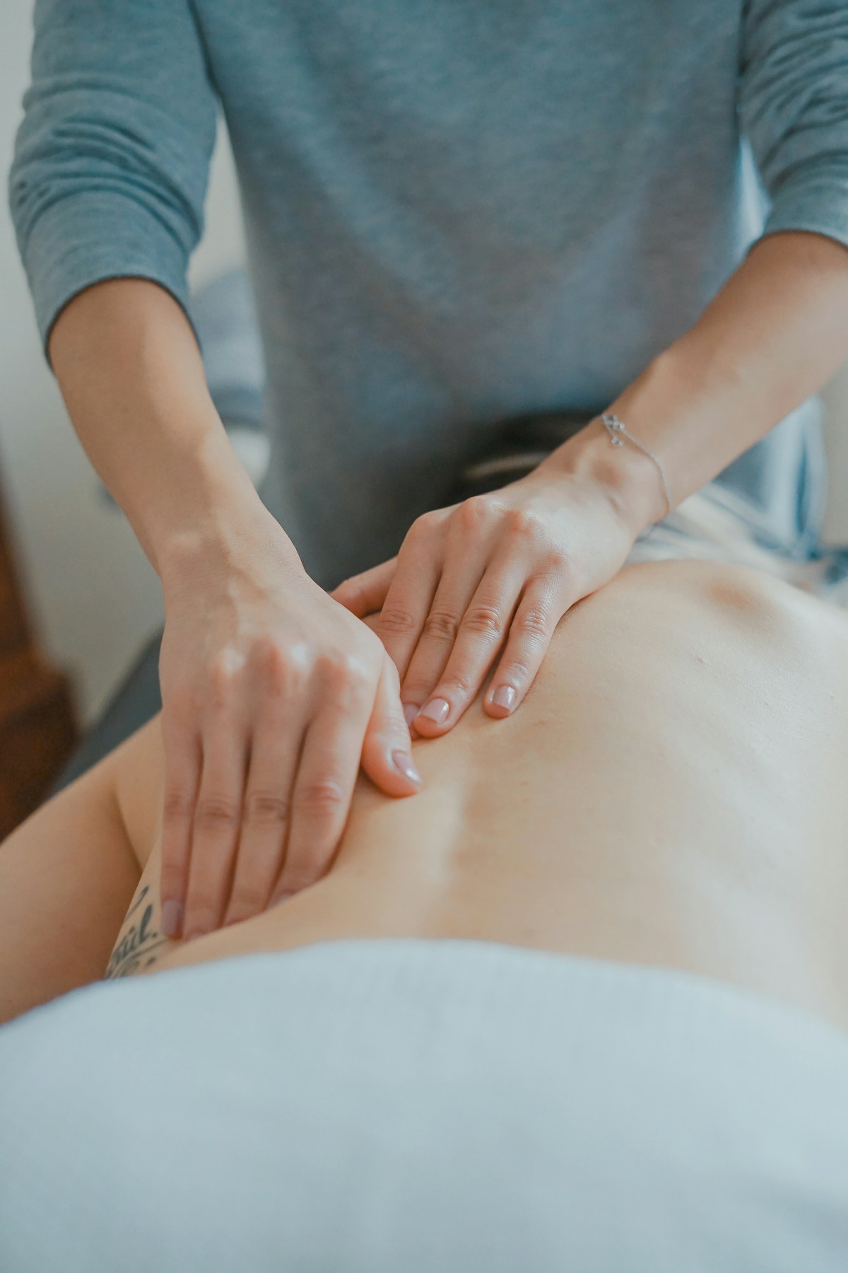 Therapist performing massage therapy